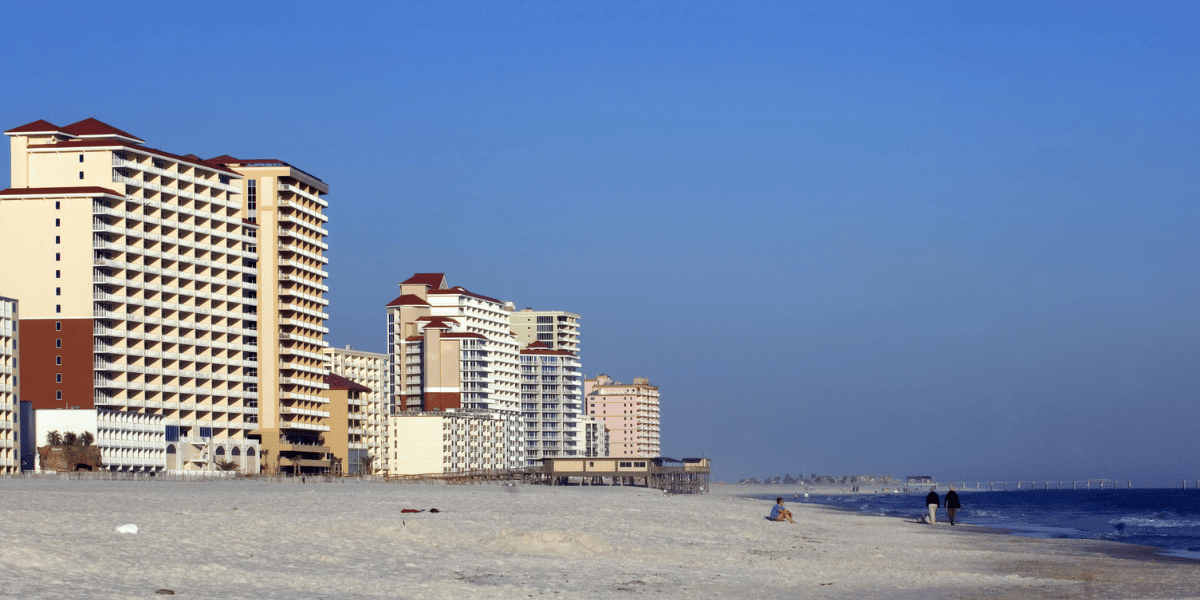 View of the condo buildings along the beach from the shoreline in Orange Beach, Alabama
